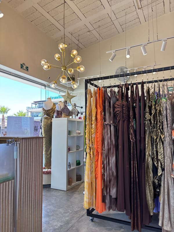 Clothing boutique interior documented in San Bernardino Tlaxcalancingo, Mexico