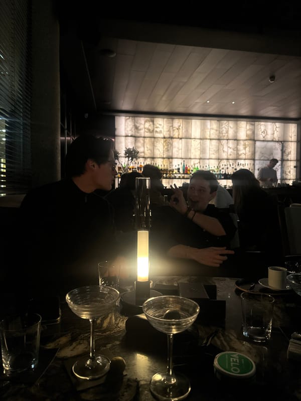 Two people share moment in Madrid bar