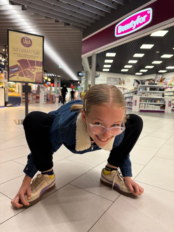 Mall visitors and dog captured in casual moments