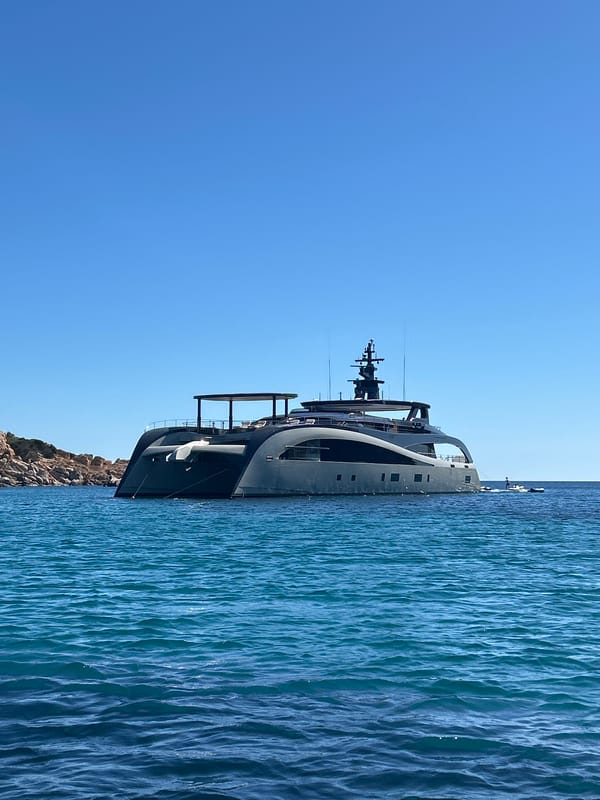 Luxury yachts anchor in pristine La Maddalena waters