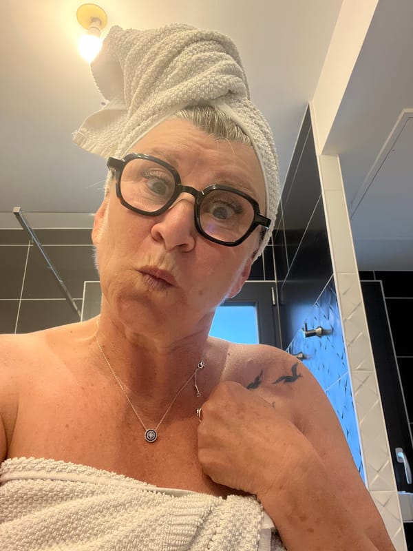 Woman observed in bathroom wearing towel in Chambœuf, France