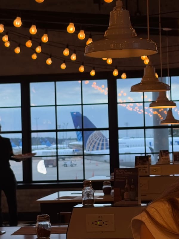 Evening airport and dining activity documented in Houston