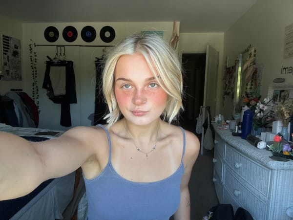 Bedroom selfie session in Whistler with record wall decor
