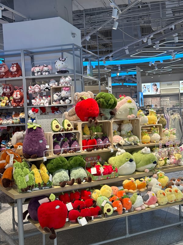 Shoppers browse malls featuring traditional displays in Guta, Linghe