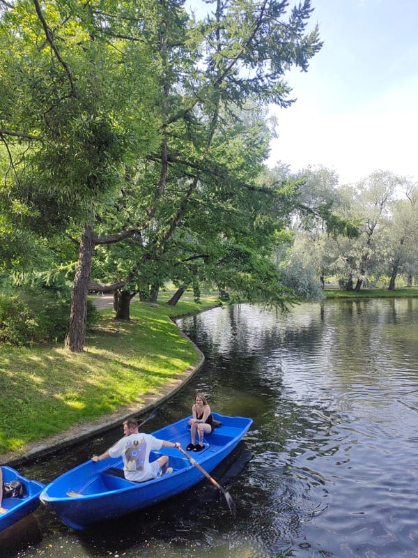 Amusement rides and boating on a sunny Saint Petersburg afternoon