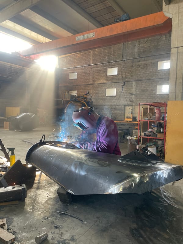 Early morning welding work observed in Montenegro workshop