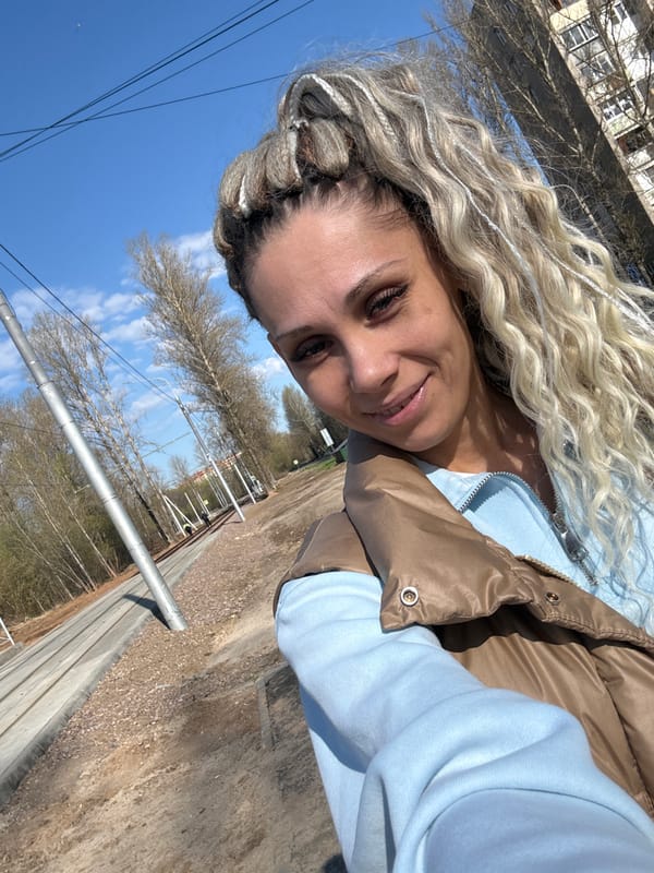 Woman documents morning outing with child in Rusanovo parks