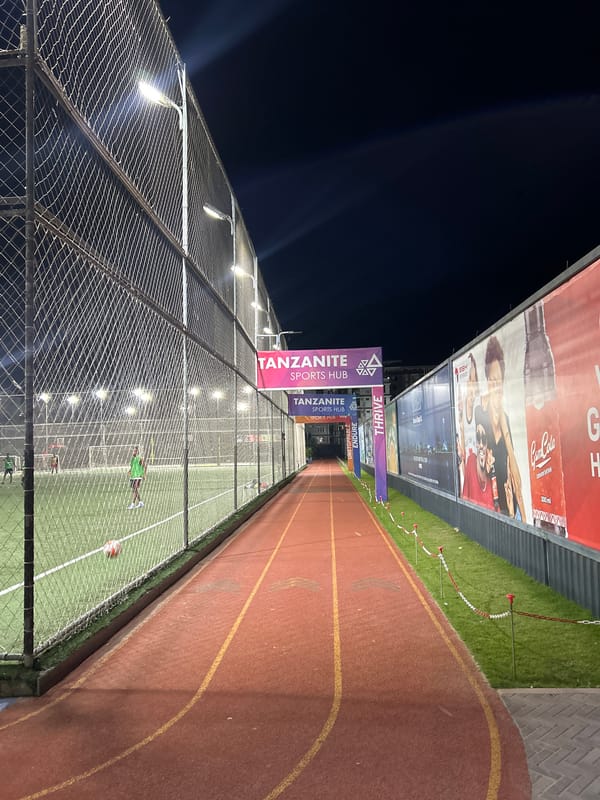Night at a Dar es Salaam sports complex, June 2026