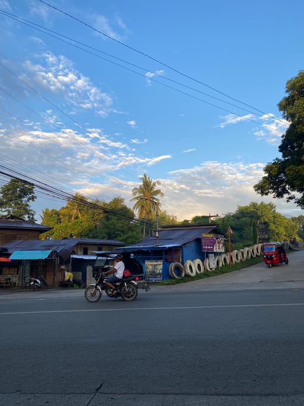 Davao City road corridor at golden hour, Crossing Bayabas