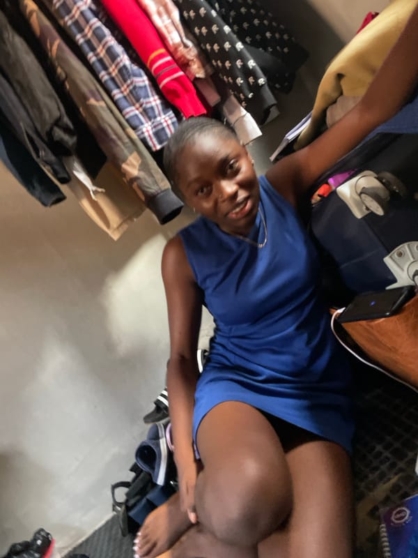 Downtime in a cluttered bedroom in Jos, Nigeria