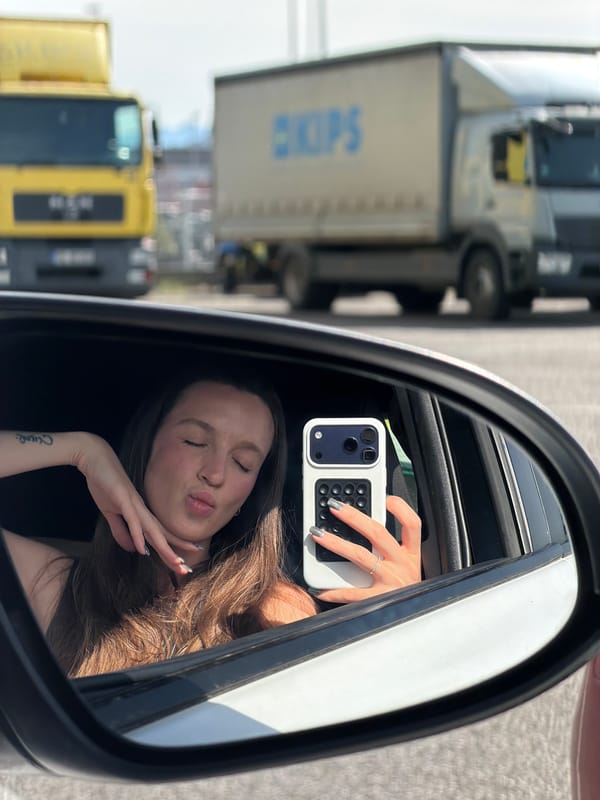 Woman takes selfies with dog in car, Montenegro