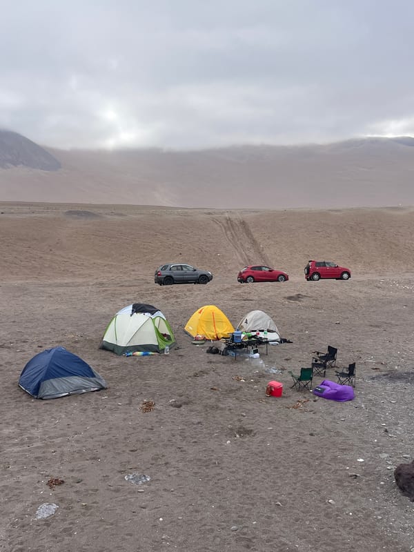 Beach camping scene documented in Iquique, Chile