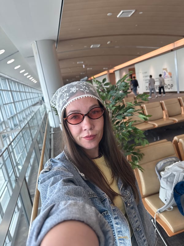 Woman photographed at Fukuoka Airport terminal early morning