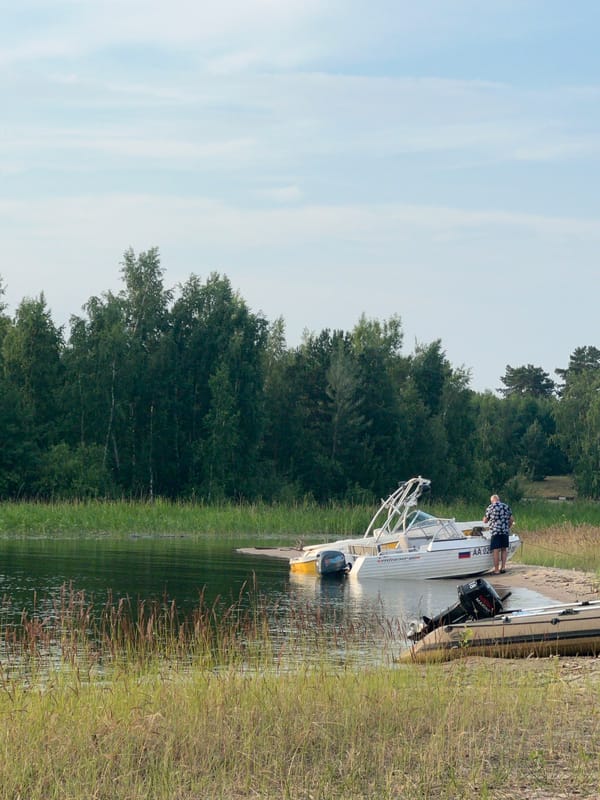 Summer evening at a lakeside camp in Borovoye, Russia