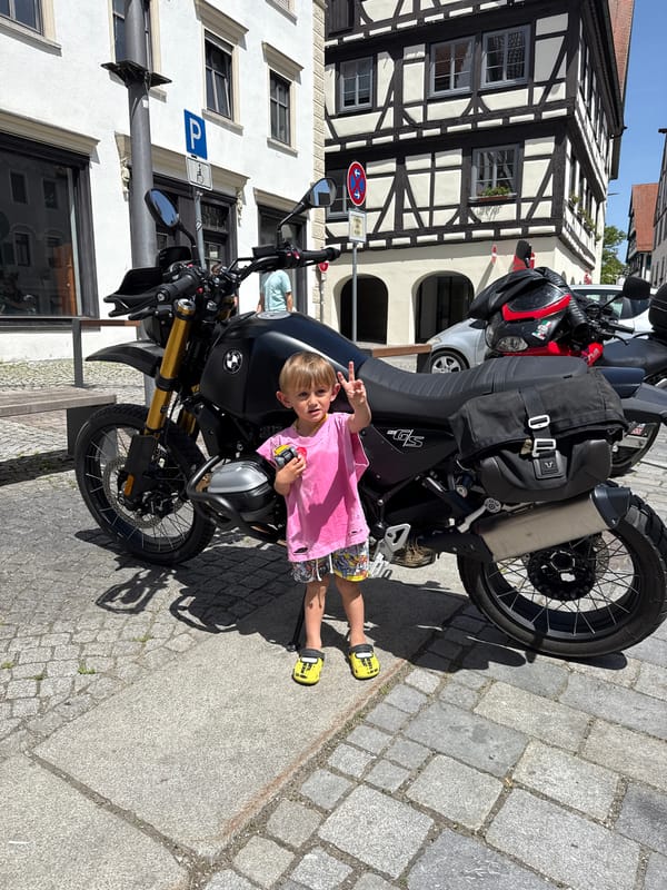 Child plays on motorcycles, enjoys ice cream in Riedlingen