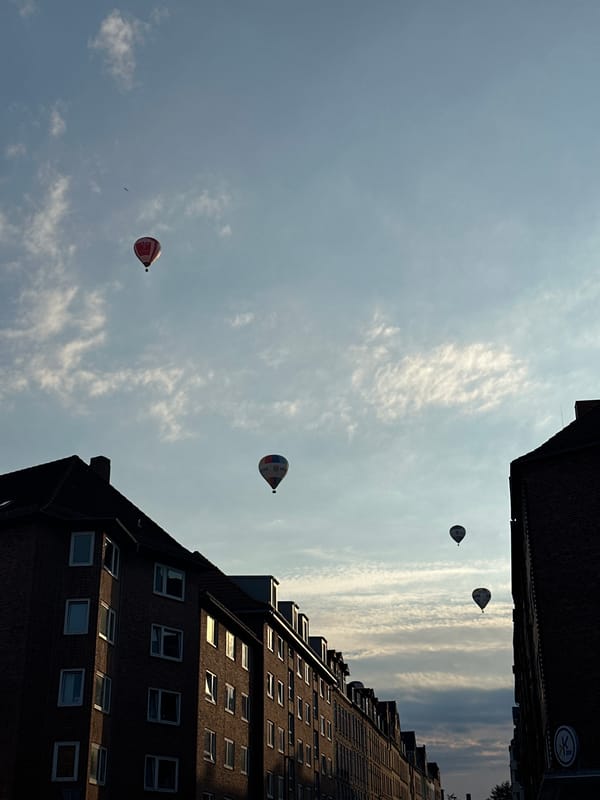 Hot air balloons fill the skies over Kiel, Germany