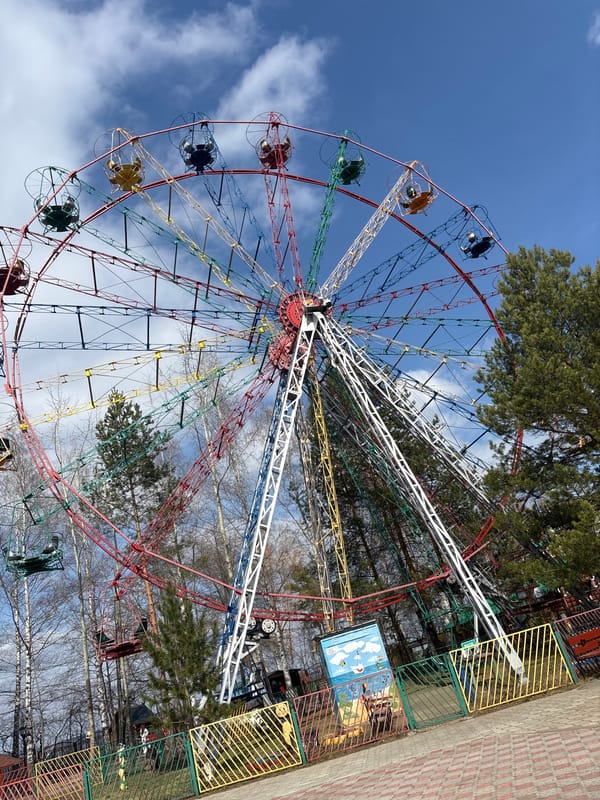 Families visit carnival rides in Chaikovsky, Russia morning