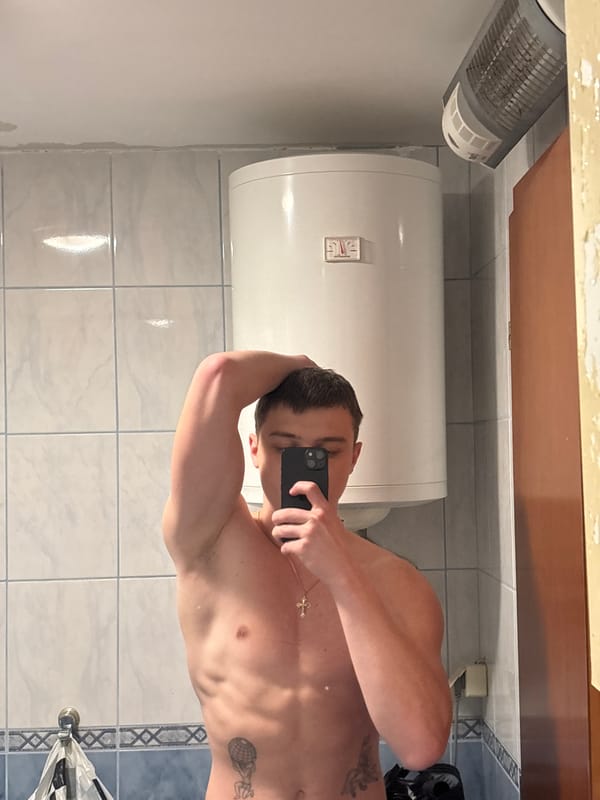 Man takes bathroom selfie in Budva, Montenegro