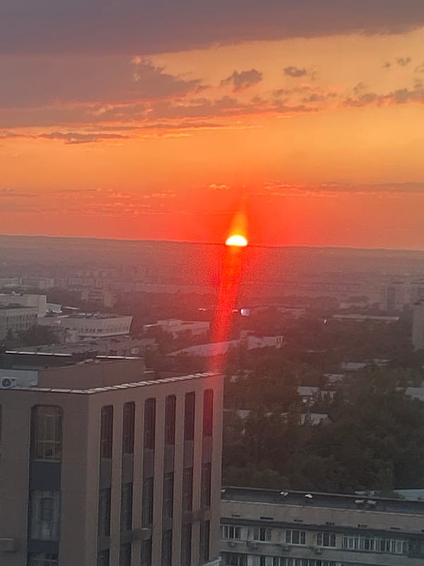 Almaty sunset, multiple vantage points, golden hour.