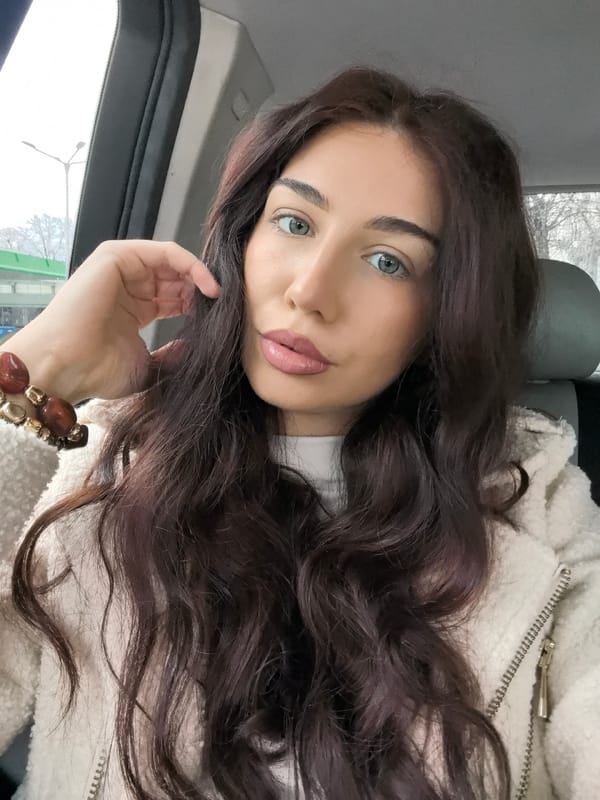 Woman takes multiple selfies around Stara Zagora, Bulgaria