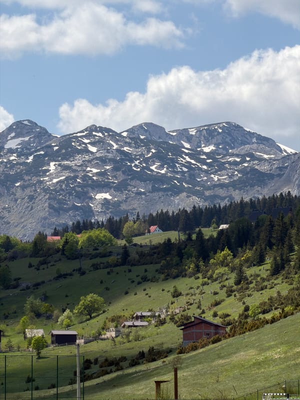Man performs backflip on mountain road in Žabljak, Montenegro