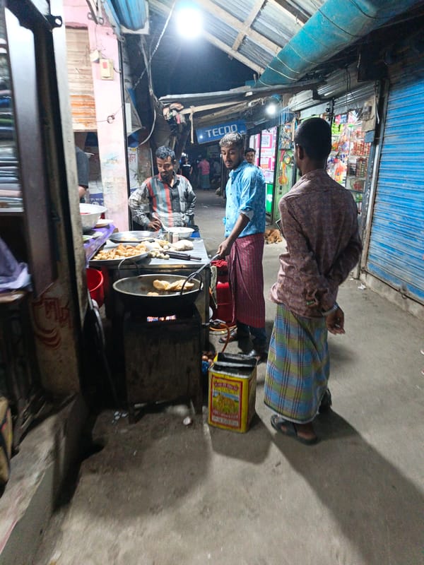 Street vendors and small businesses operate across Bangladesh markets