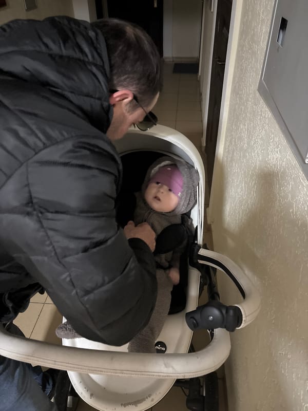 Indoor infant care moments captured in Sochi homes
