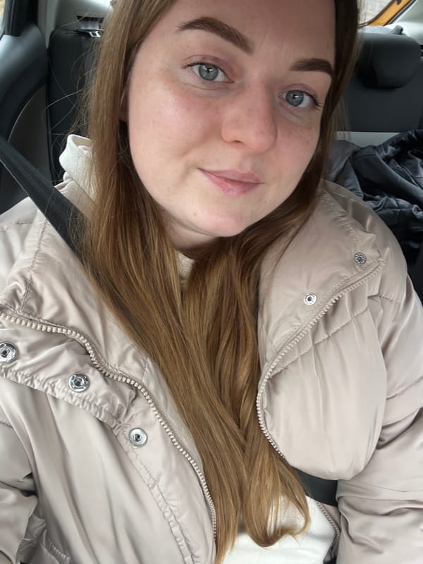 Woman takes car selfie in Rogachovo, Russia