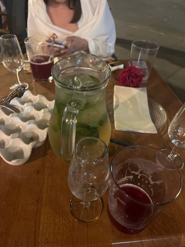 Social gathering documented at Sevilla table with drinks