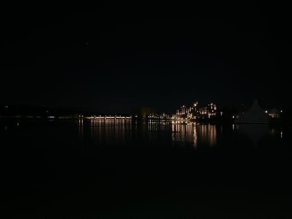 Nighttime scenes captured in Pravets, Bulgaria show waterfront buildings, city entrance