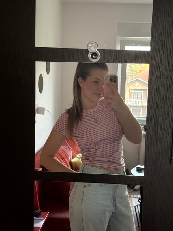 Woman takes mirror selfie in Belgrade suburb Friday morning