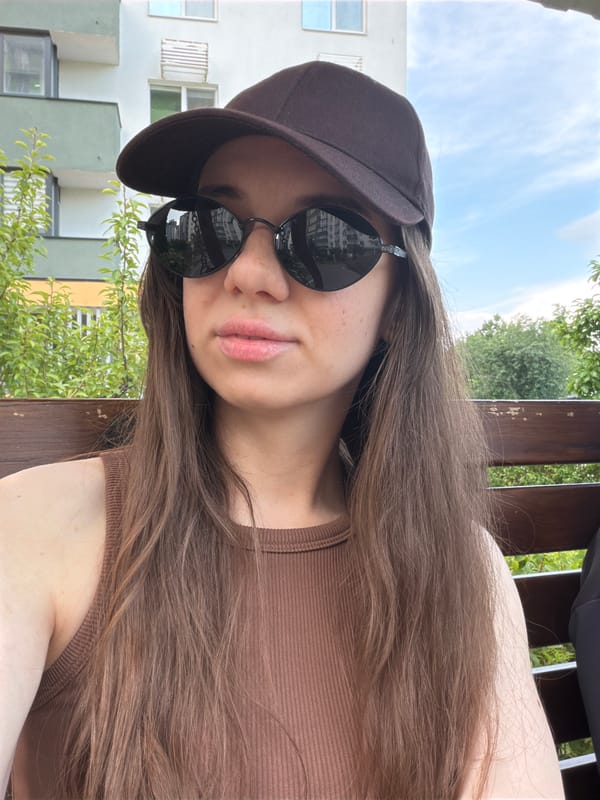 Relaxed outdoor bench moment in Kyiv on a summer afternoon