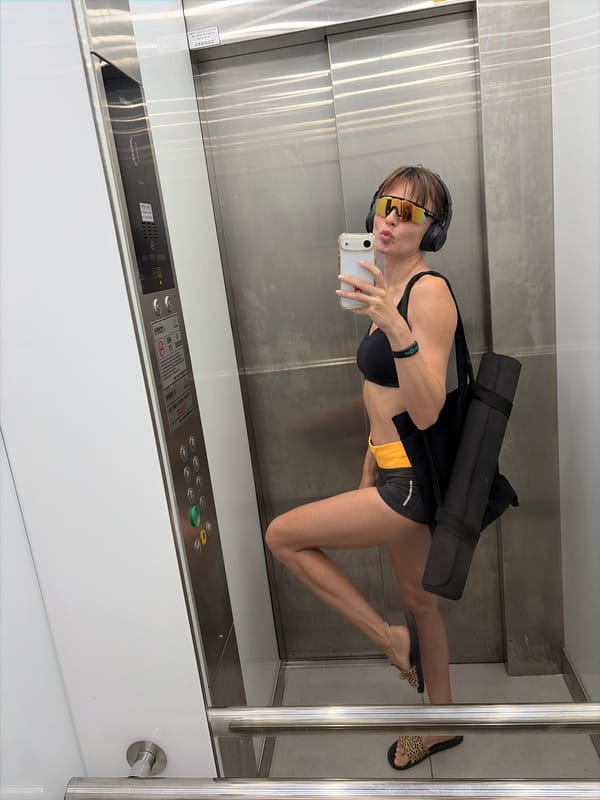 Elevator mirror selfie in Tel Aviv, full workout mode.