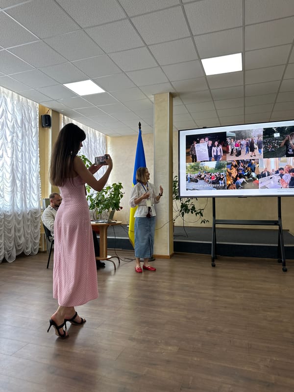 Community presentation in Myronivka hall, civic gathering underway