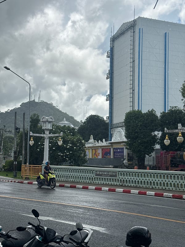Phuket Old Town on a rainy Pride morning, flags and all