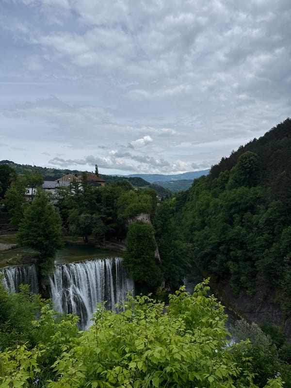 Tourist documents Pliva Waterfall visit in Jajce, Bosnia Herzegovina