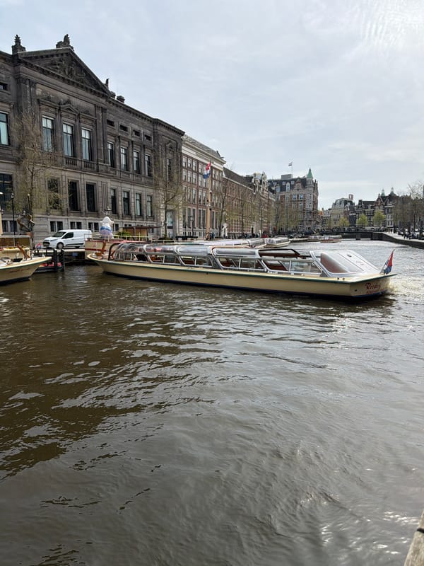 Spring morning scenes captured across Amsterdam canals and streets
