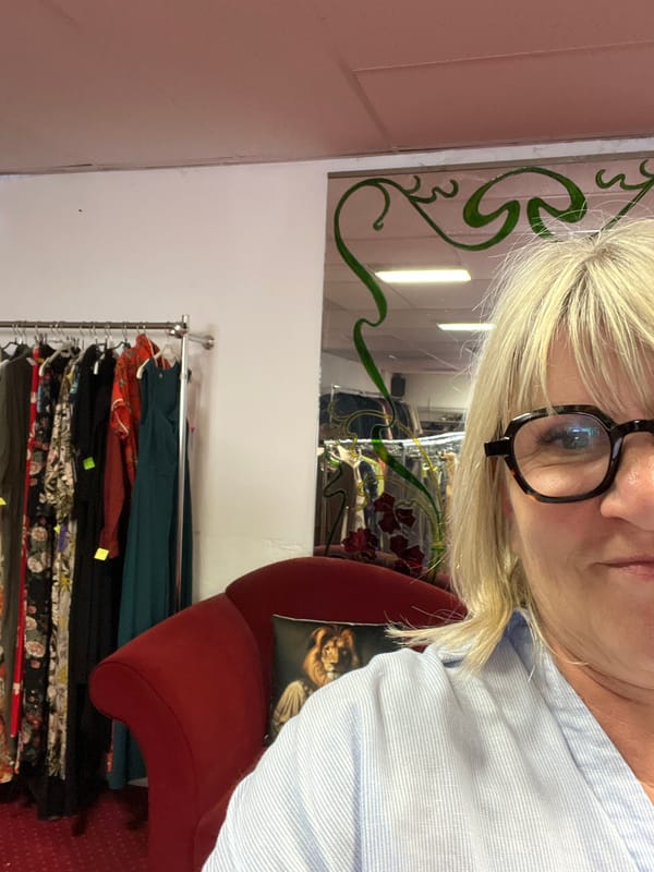 Woman shops, takes selfies in Montélimar clothing store
