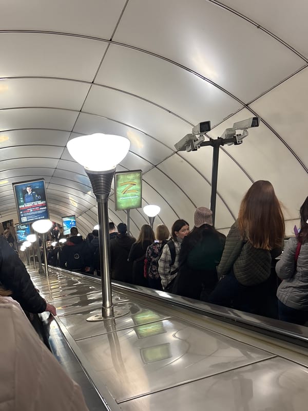 Morning commuters ride escalators in Saint Petersburg metro station