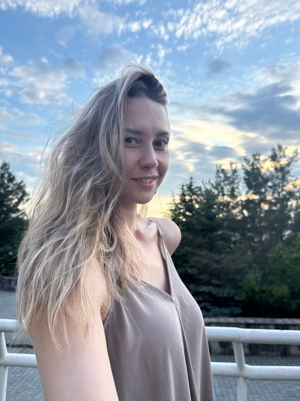 Woman takes outdoor selfies in Nebug, Russia