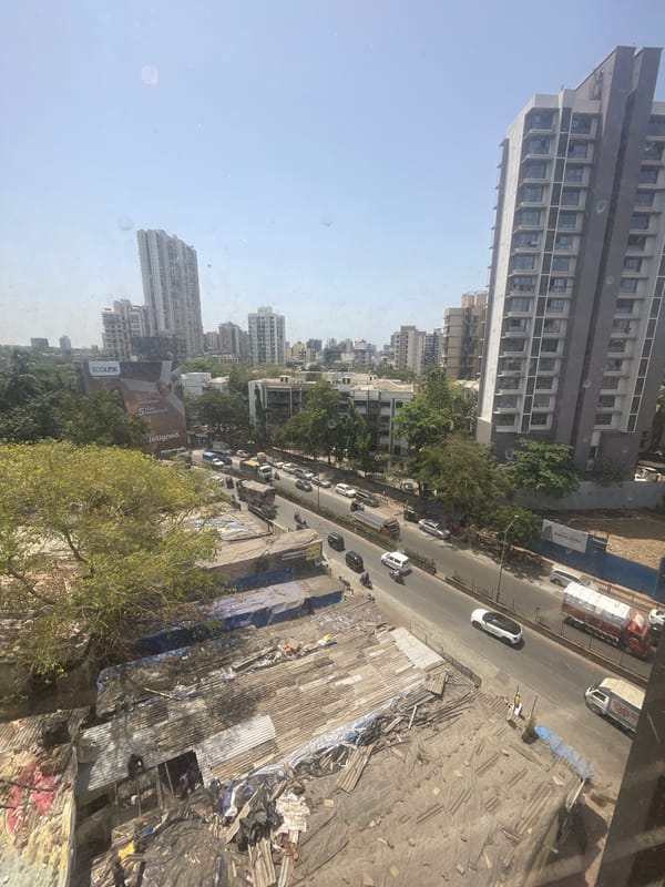 Morning scenes captured in Mumbai: street traffic, hotel room