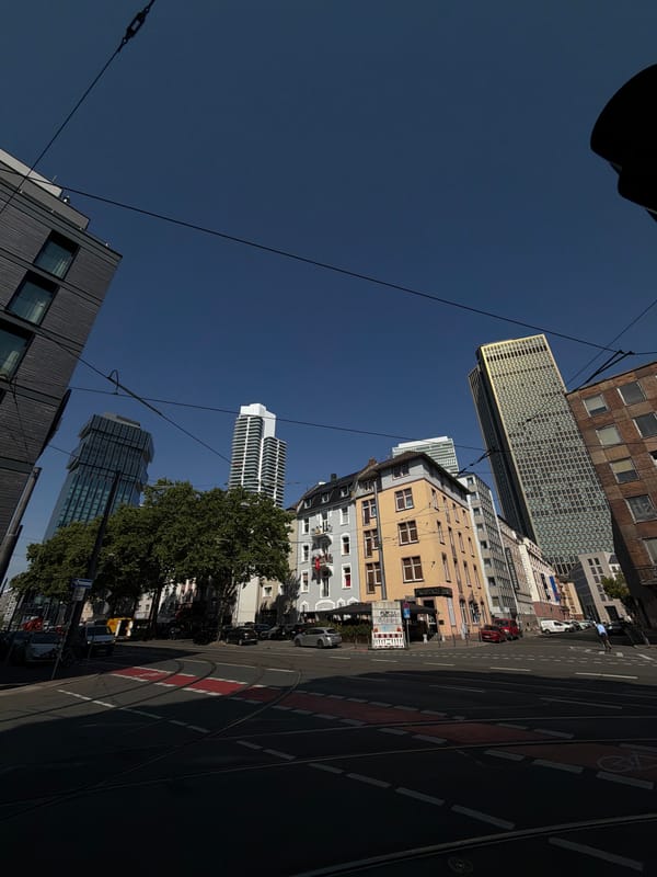 Frankfurt streets on a sunny morning: trams, cafes, and facades