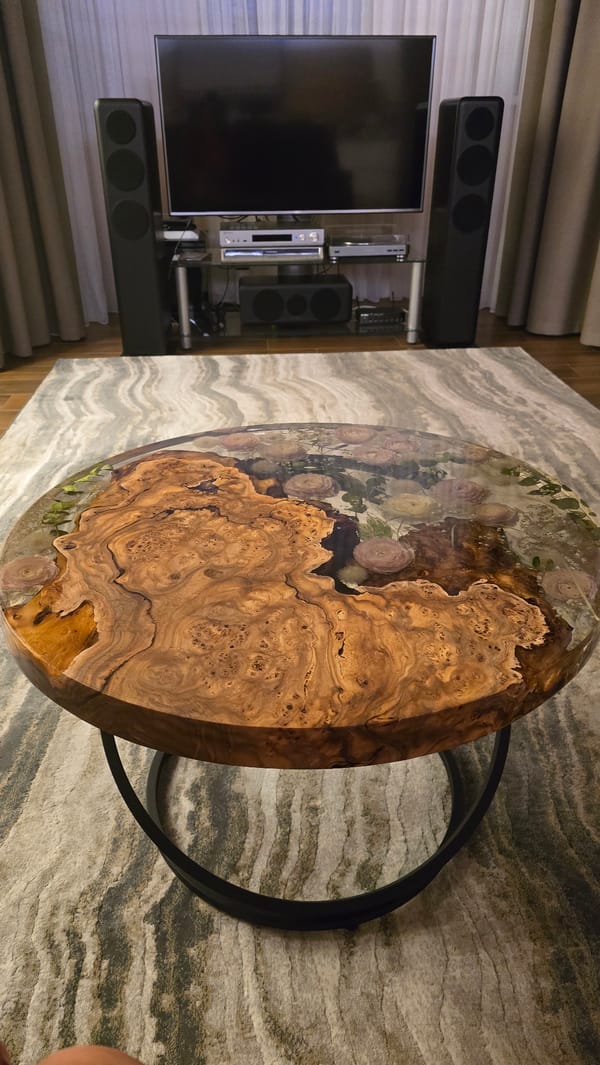 Resin-embedded wood coffee table documented in Kaliningrad interior
