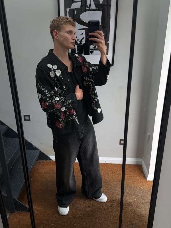 Mirror selfie captured in London showing embroidered denim jacket