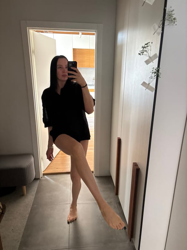 Woman takes selfies with sunflowers in Chaikovsky morning routine