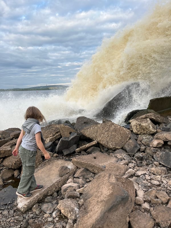 Visitors document water discharge facility in Chernushka, Russia