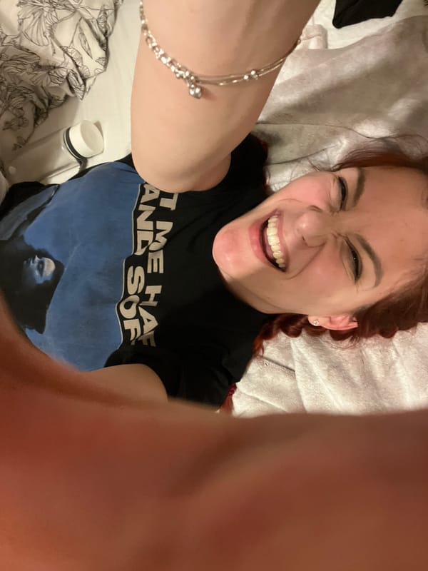 Woman takes series of selfies on bed in Sofia