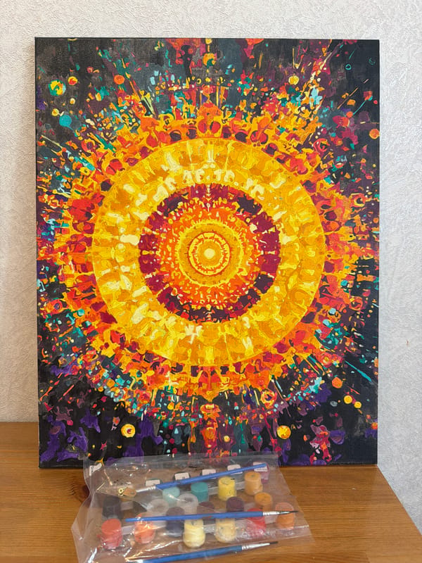 Paint-by-numbers sun artwork completed in Russian village