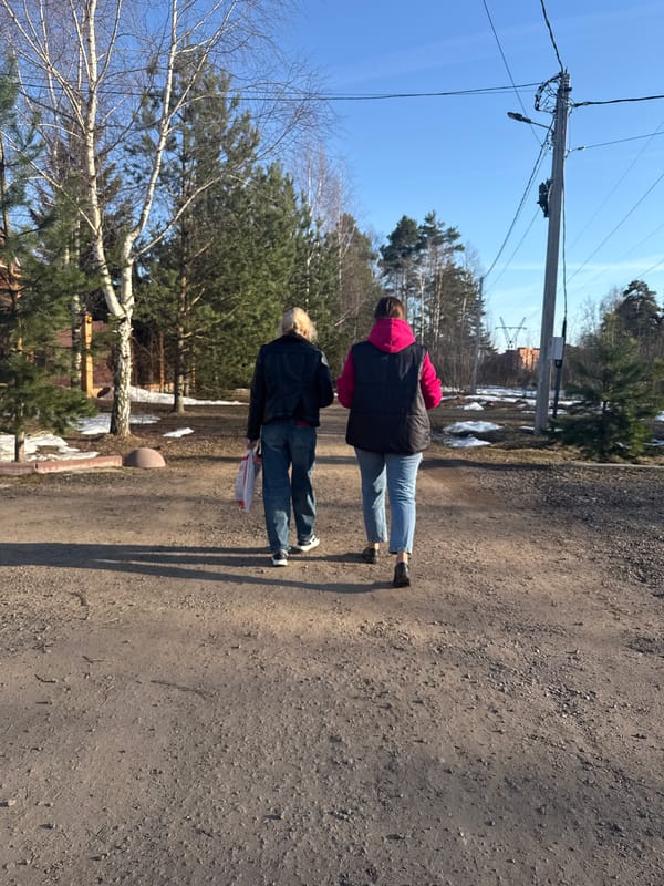 Woman and child enjoy casual outdoor afternoon in Dmitrov