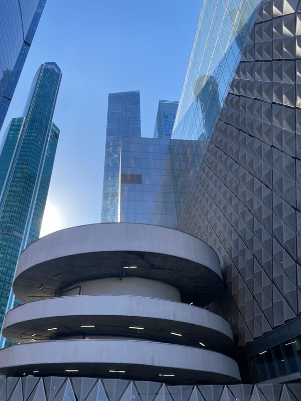 Woman photographed amid modern architecture and construction in Khimki